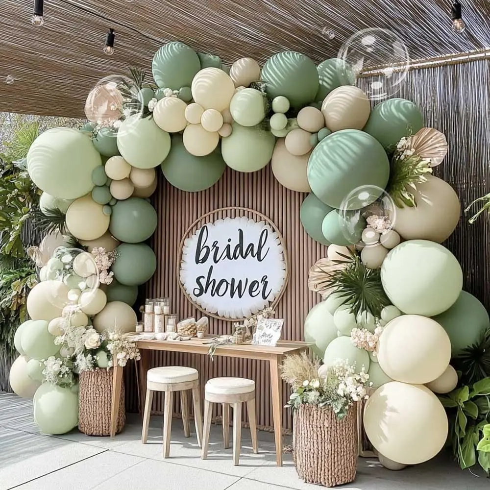 arche de ballons pour baby shower vert sauge